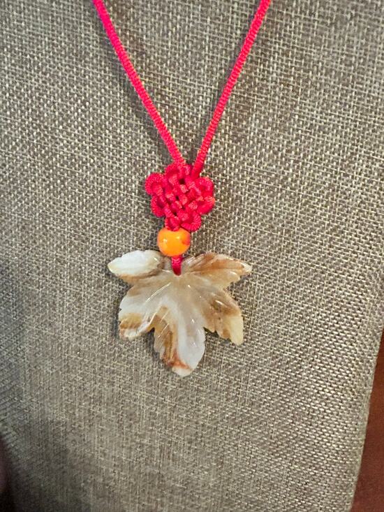 Unbranded Jewelry - Hand Carved Chalcedony Maple Leaf Pendant Necklace Red Cord Accent